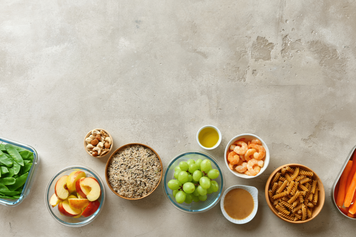 a variety of foods in bowls on a table